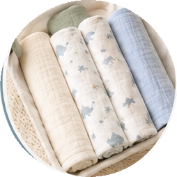 Stack of muslin baby blankets